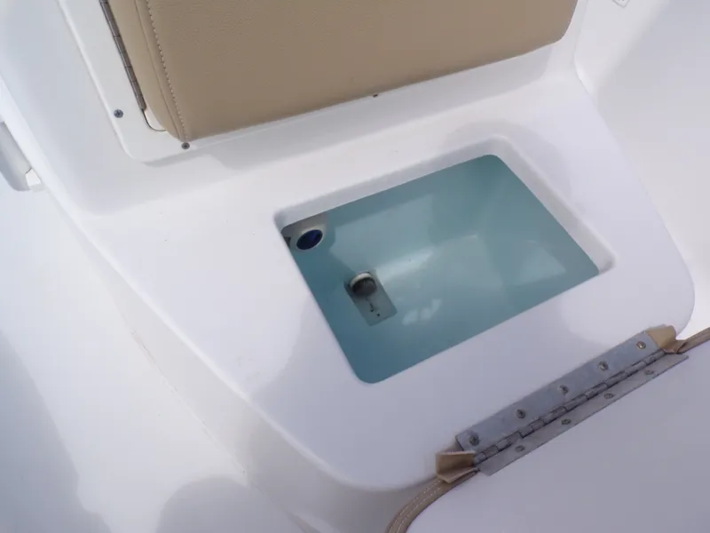Slide: The Image of 2016 Sportsman 207 Masters boat with open storage compartment. - 9