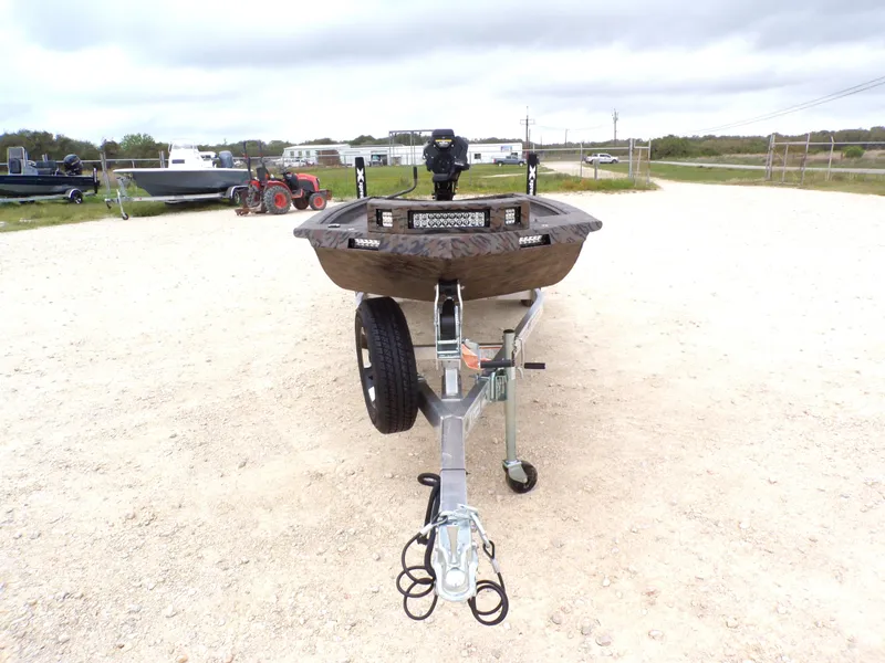 Slide: The Image of 2026 Xpress Bayou 180 boat on a trailer. - 10