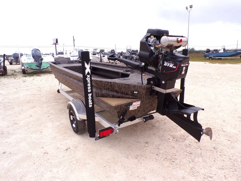 Slide: The Image of 2026 Xpress Bayou 180 boat on trailer, exterior view. - 14