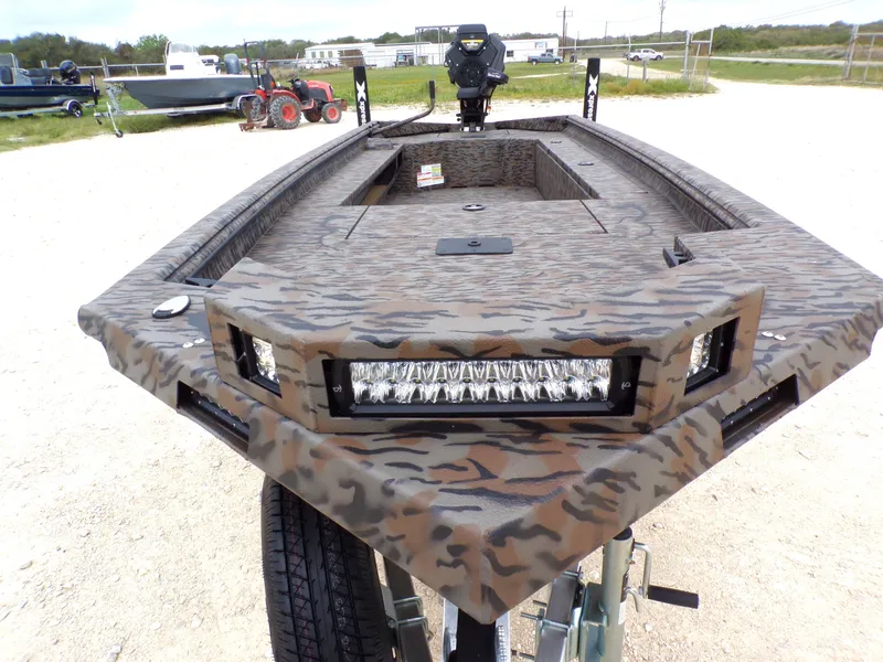Slide: The Image of 2026 Xpress Bayou 180 boat with camouflage pattern and LED lights. - 15