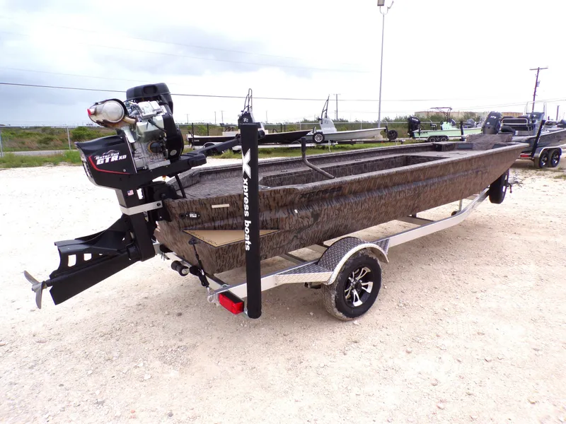 Slide: The Image of 2026 Xpress Bayou 180 boat on trailer, side view. - 3