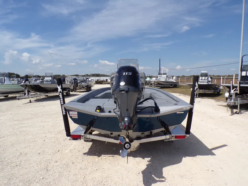 Slide: The Image of 2025 Xpress H20B Bay boat on a trailer. - 10