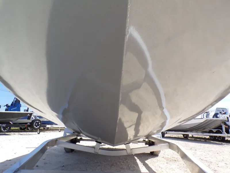 Slide: The Image of Close-up of 2025 Xpress H20B Bay boat on a trailer. - 6