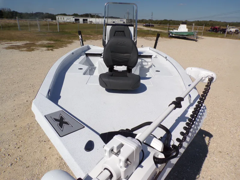 Slide: The Image of 2026 Xpress H20B Bay boat with helm chair and equipment. - 11