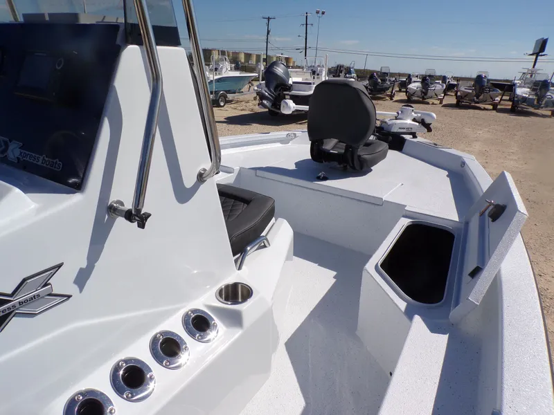 Slide: The Image of 2026 Xpress H20B Bay boat with open storage and seating. - 16