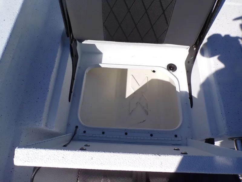 Slide: The Image of Storage compartment in Xpress H20B Bay boat, 2026 model. - 21