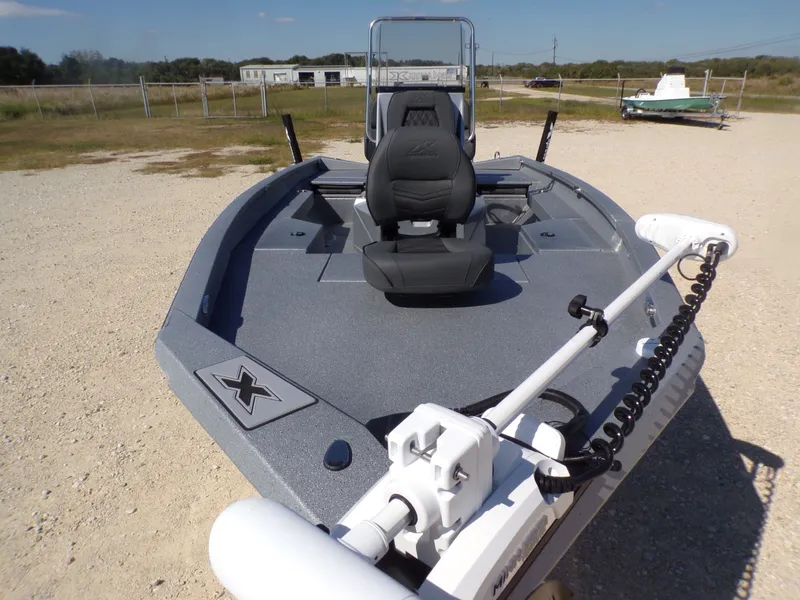 Slide: The Image of 2026 Xpress H20B Bay boat with steering chair and motor. - 11