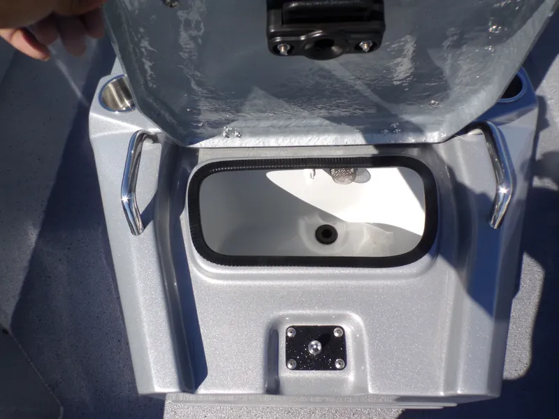 Slide: The Image of Open storage compartment in 2026 Xpress H20B Bay boat. - 13