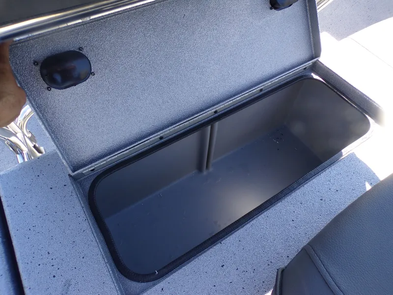 Slide: The Image of Open storage compartment in 2026 Xpress H20B Bay boat. - 17
