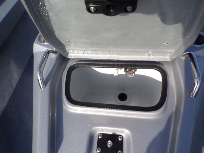 Slide: The Image of Open storage compartment in Xpress H20B Bay boat 2026. - 14