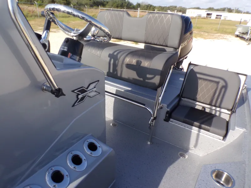 Slide: The Image of Interior of Xpress H20B Bay boat, model year 2026. - 19