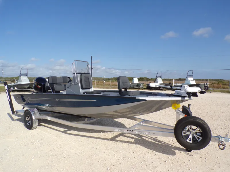 Slide: The Image of 2026 Xpress H20B Bay boat on trailer outdoors. - 6
