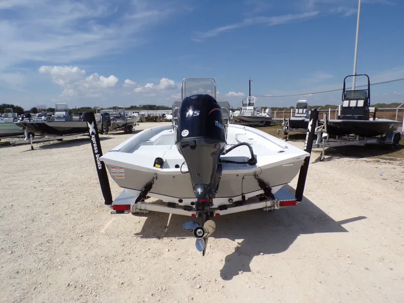 Slide: The Image of 2025 Xpress H20B Bay boat on trailer, rear view. - 10