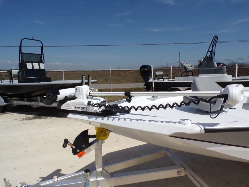 Slide: The Image of 2025 Xpress H20B Bay boat with Minn Kota trolling motor. - 22