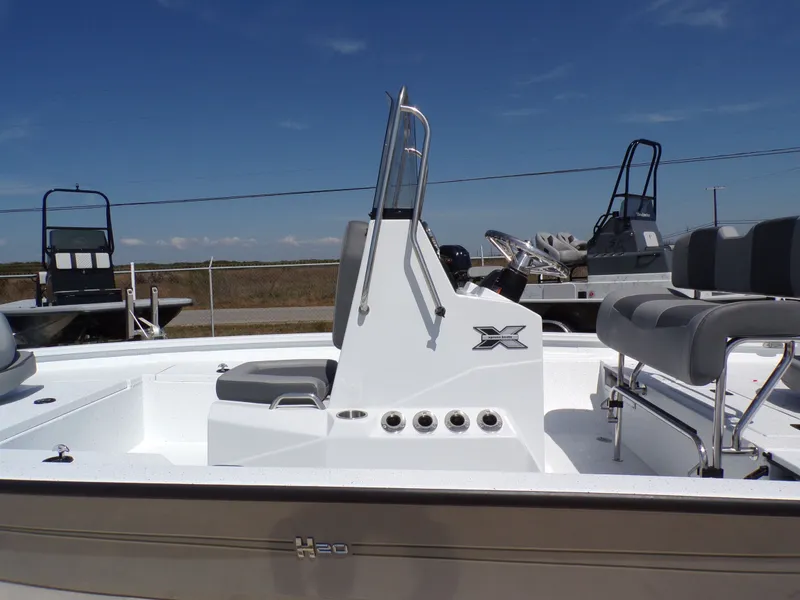 Slide: The Image of 2025 Xpress H20B Bay boat with console and seating. - 24