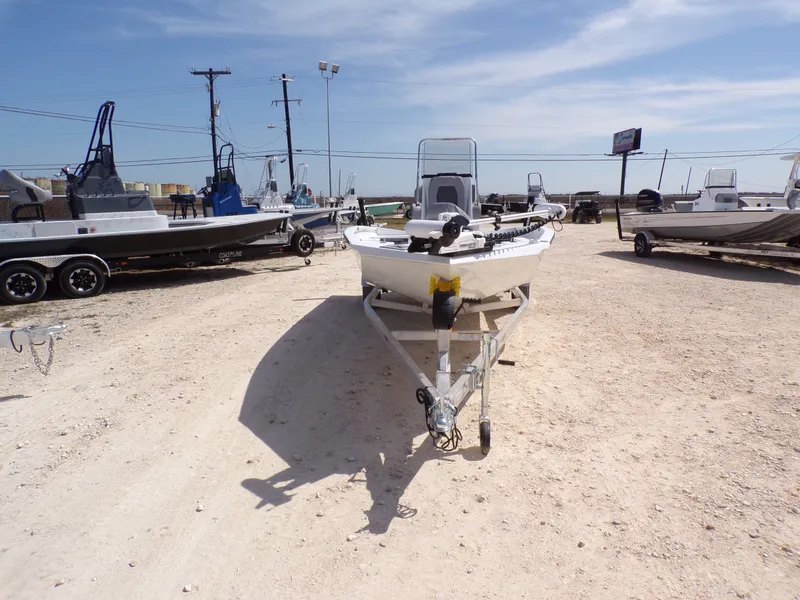 Slide: The Image of 2025 Xpress H20B Bay boat on trailer outdoors. - 5