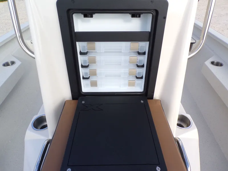 Slide: The Image of Xpress H20BAY 2026 boat with built-in storage and cup holders. - 17