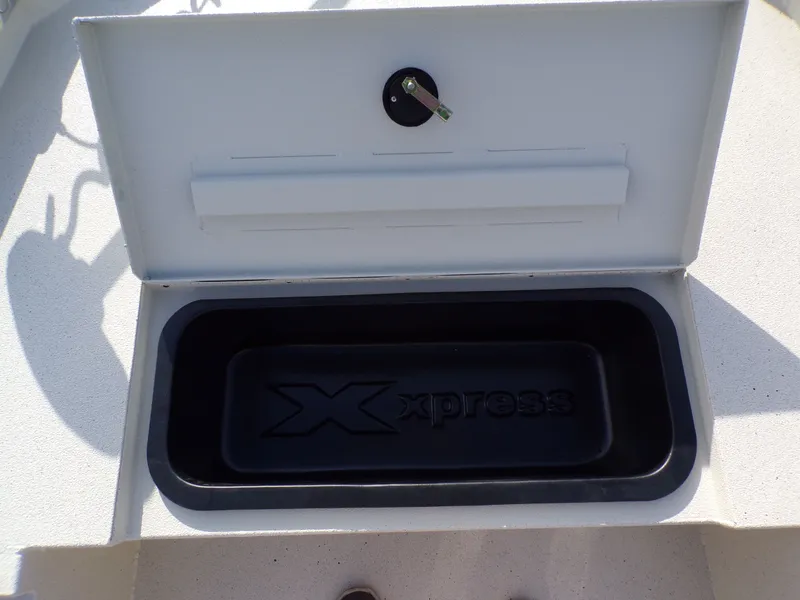 Slide: The Image of 2026 Xpress H20BAY boat hatch with storage compartment. - 20