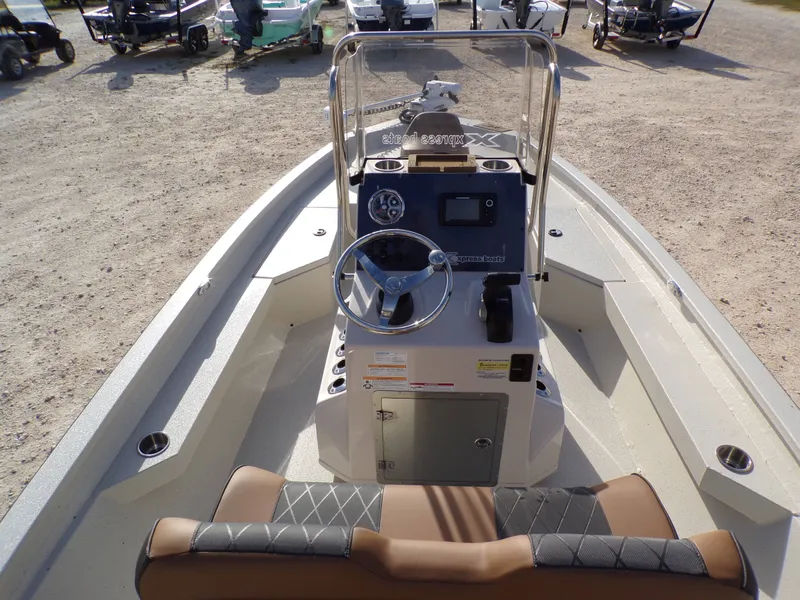 Slide: The Image of 2026 Xpress H20BAY boat interior with steering console. - 23
