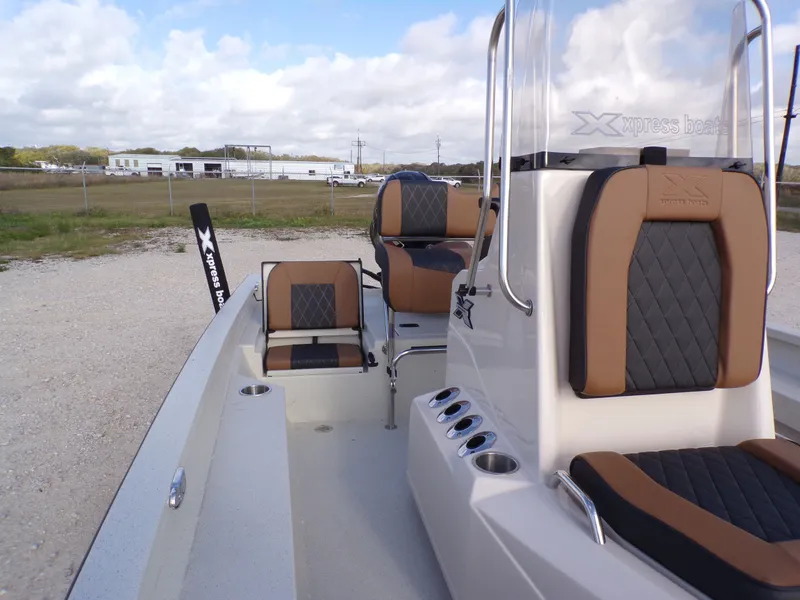 Slide: The Image of 2026 Xpress H20BAY boat with modern seating and console. - 6
