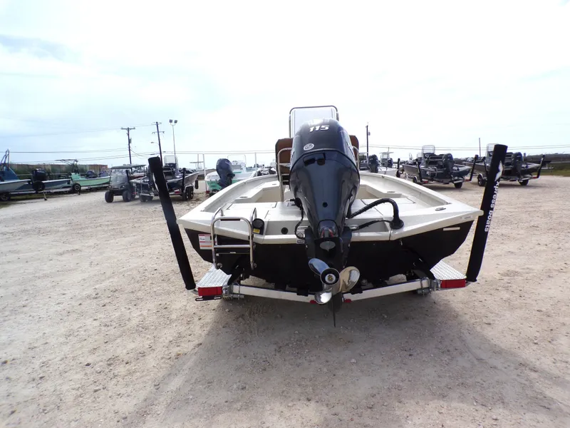 Slide: The Image of Rear view of a 2026 Xpress H20BAY boat on a trailer. - 9