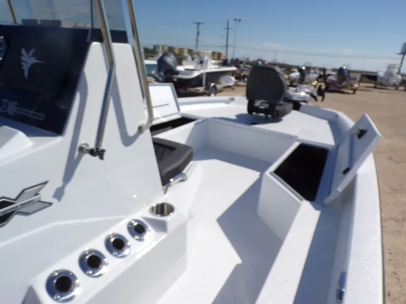 Slide: The Image of 2026 Xpress H22B Bay boat with open storage and seating area. - 18