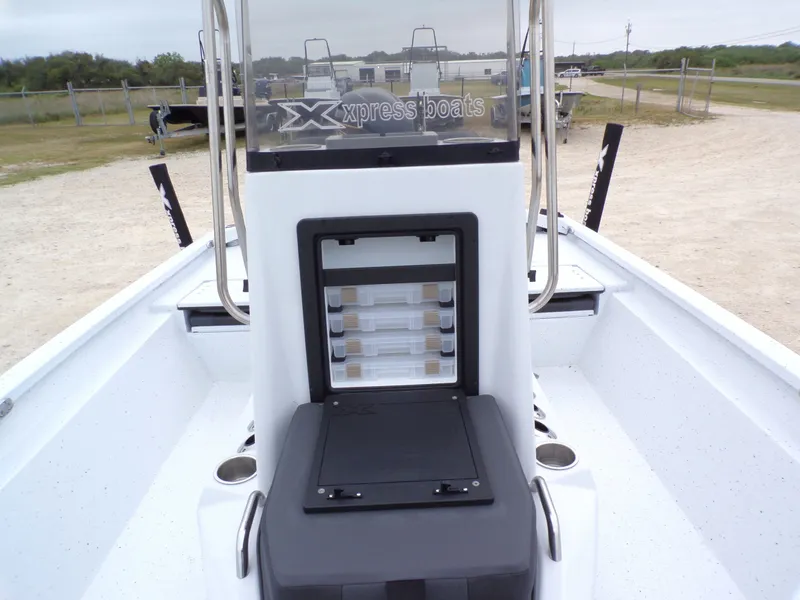 Slide: The Image of Xpress SW20B 2026 boat with storage and seating area. - 18