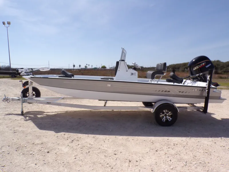 The Image of 2026 Xpress SW20B boat on trailer outdoors. - 1