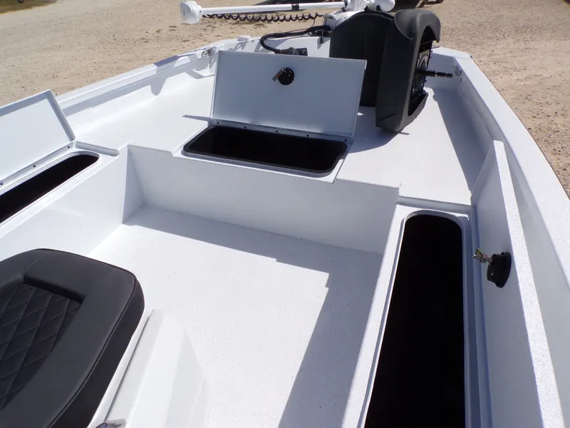 Slide: The Image of Interior of Xpress SW20B boat, 2026 model, featuring storage compartments and seating. - 17