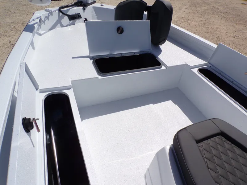 Slide: The Image of Interior of 2026 Xpress SW20B boat with storage compartments and seating. - 18