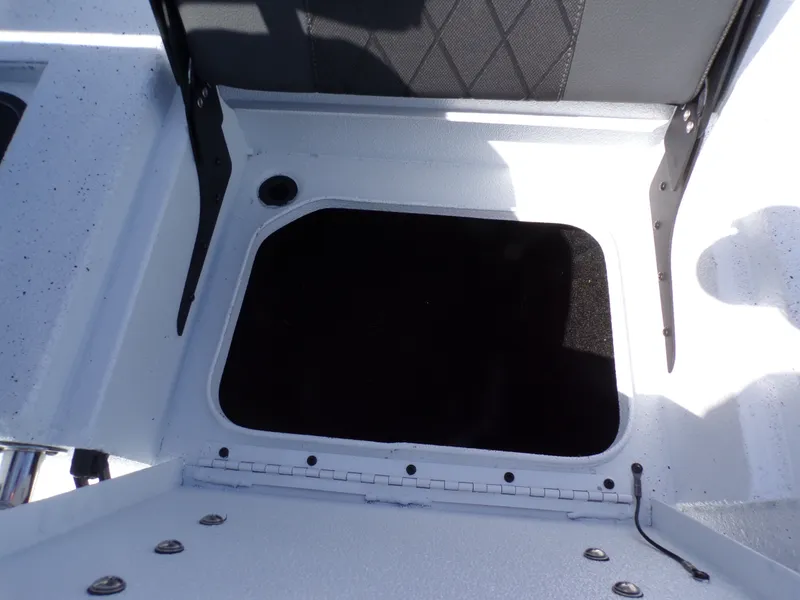 Slide: The Image of Storage compartment in Xpress SW20B boat, model year 2026. - 24