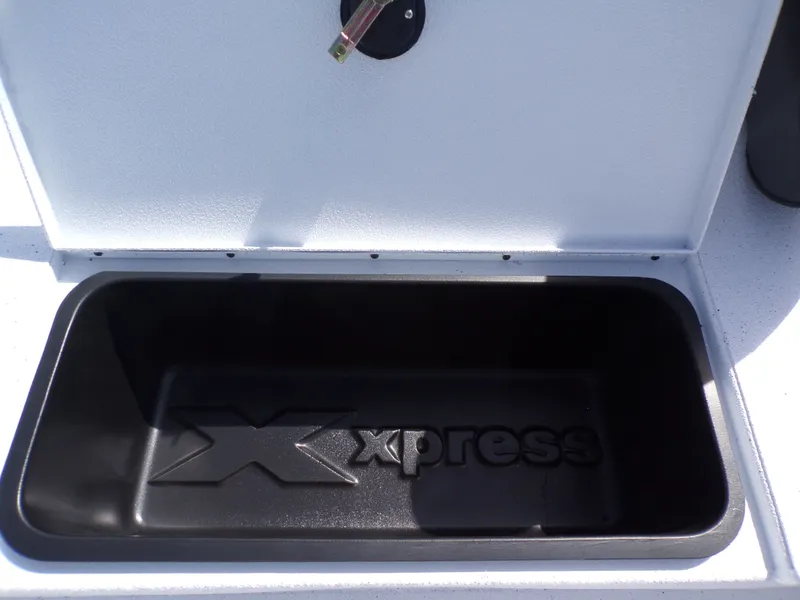 Slide: The Image of Xpress SW20B 2026 boat compartment with storage. - 25