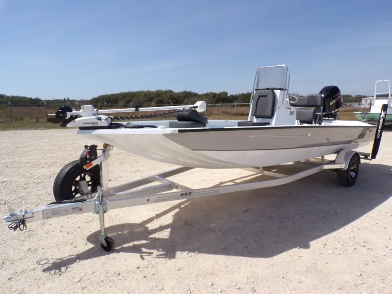 Slide: The Image of 2026 Xpress SW20B boat on trailer parked outdoors. - 3
