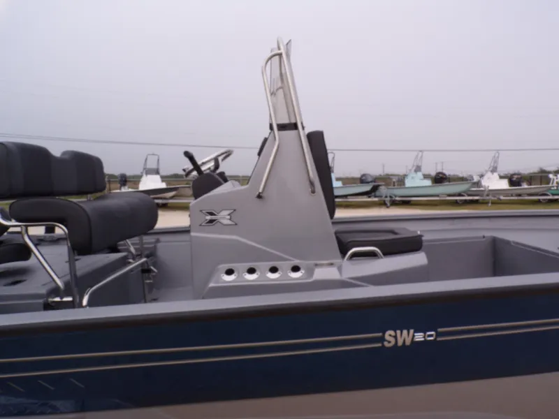 Slide: The Image of Xpress SW20B 2026 boat with modern steering console. - 28