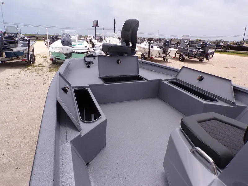 Slide: The Image of 2026 Xpress SW22B boat with spacious deck and seating area. - 25