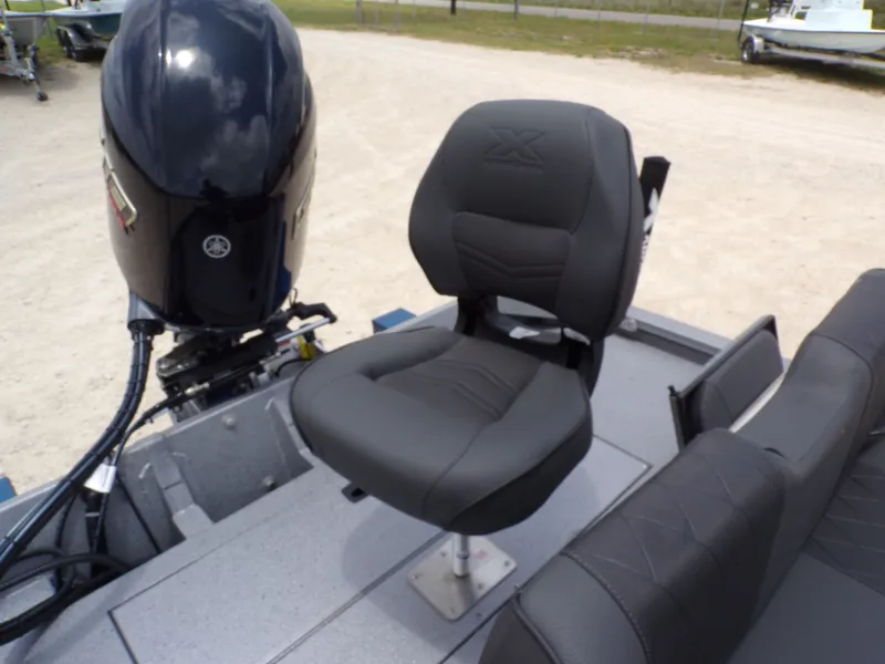 Slide: The Image of 2026 Xpress SW22B boat with Yamaha outboard motor. - 33