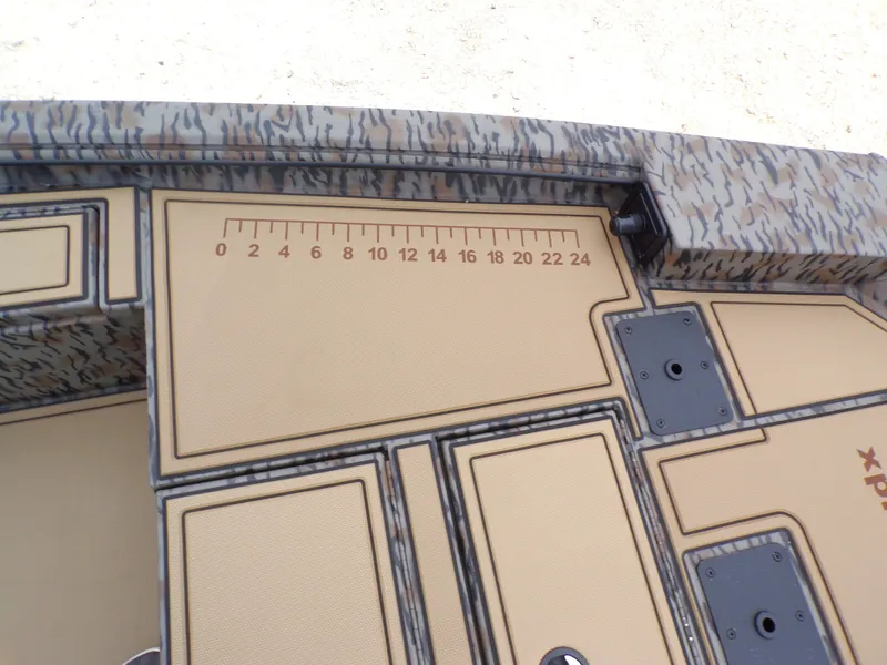 Slide: The Image of Xpress X18DB 2026 boat with measurement scale on deck. - 23