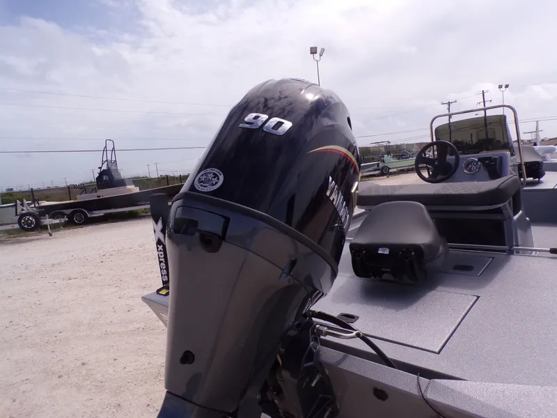 Slide: The Image of 2026 Xpress XP18CC boat with Yamaha 90 HP outboard motor. - 12