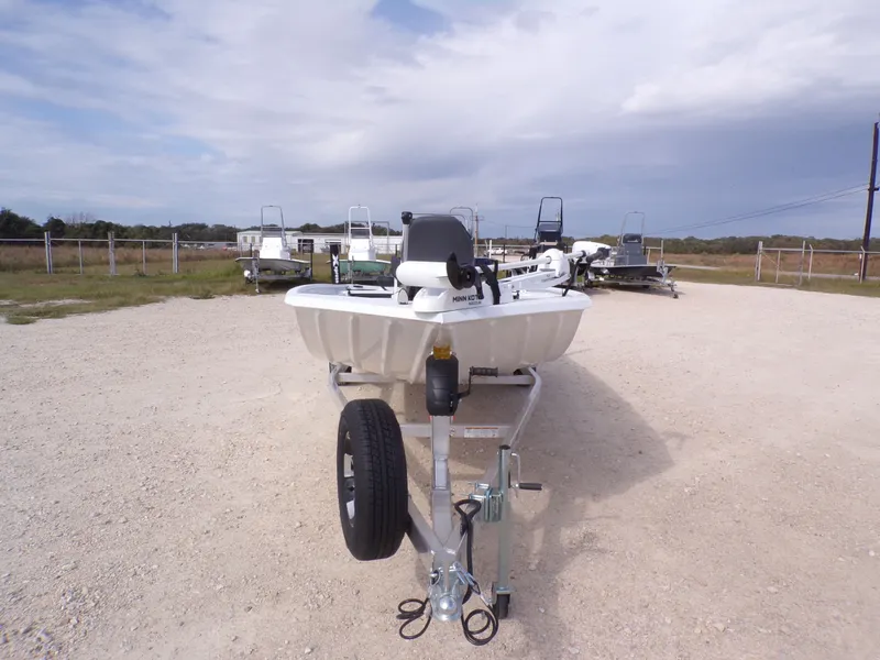 Slide: The Image of 2026 Xpress XP20CC boat on trailer, ready for adventure. - 11
