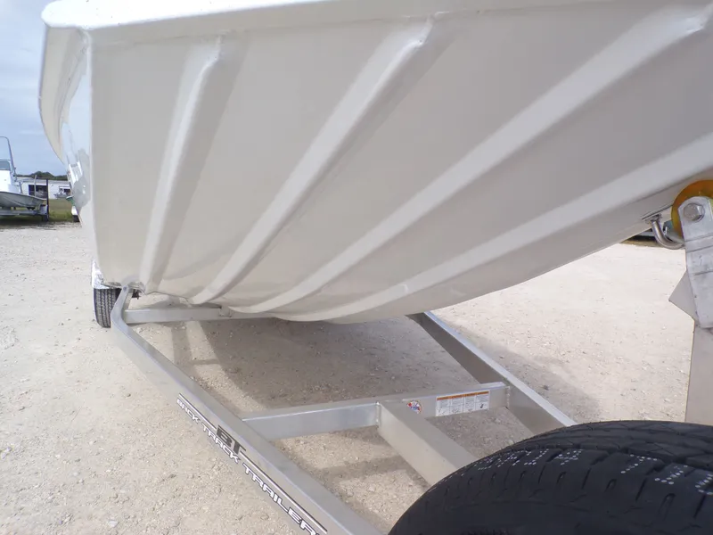 Slide: The Image of Underside of a 2026 Xpress XP20CC boat on trailer. - 12