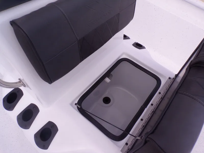 Slide: The Image of Xpress XP20CC 2026 boat seat with storage and cup holders. - 17