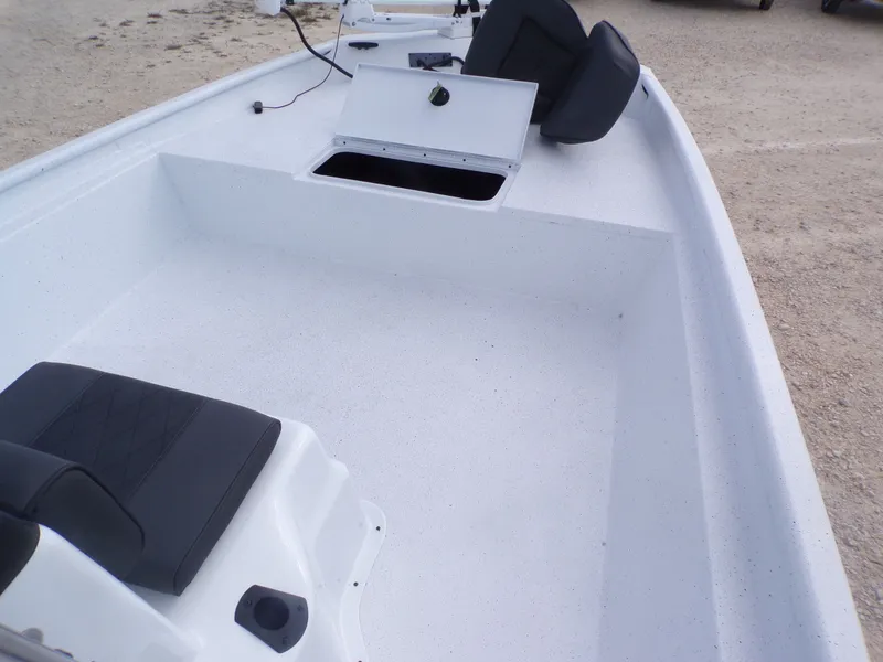 Slide: The Image of Interior of 2026 Xpress XP20CC boat with seating and storage. - 18