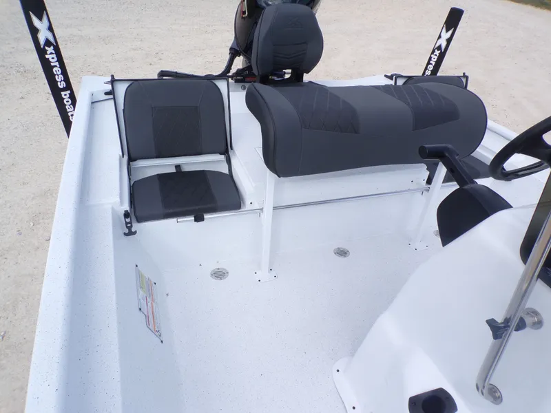 Slide: The Image of Interior of 2026 Xpress XP20CC boat with gray seating. - 21