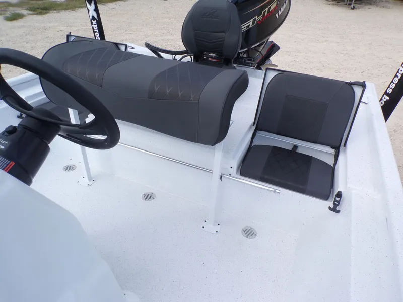 Slide: The Image of Interior of 2026 Xpress XP20CC with gray seating. - 22