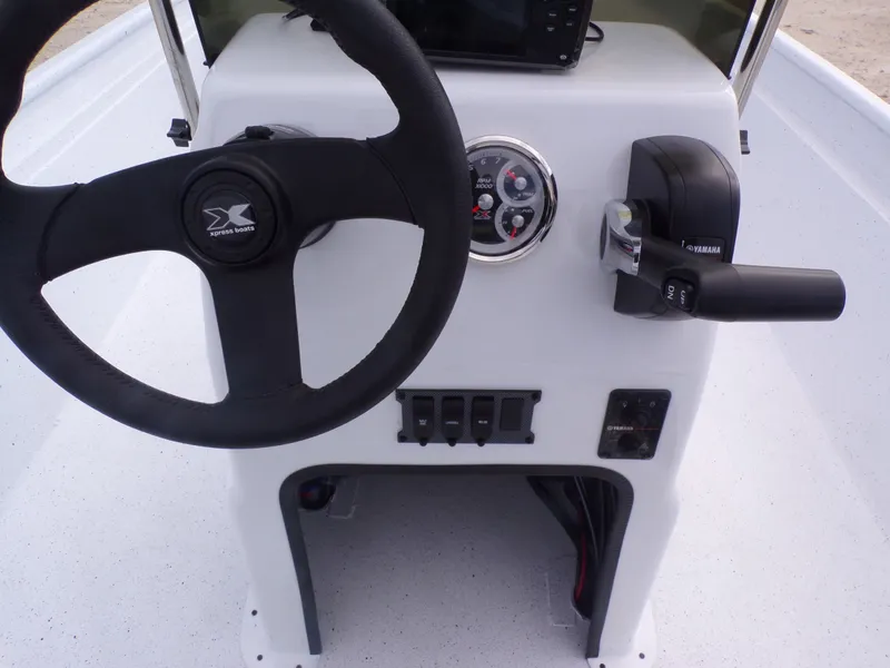 Slide: The Image of Steering console of Xpress XP20CC boat, model year 2026. - 26