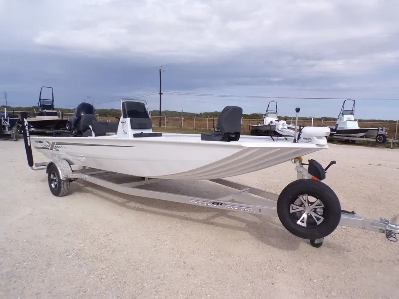 Slide: The Image of 2026 Xpress XP20CC boat on trailer, side view. - 3