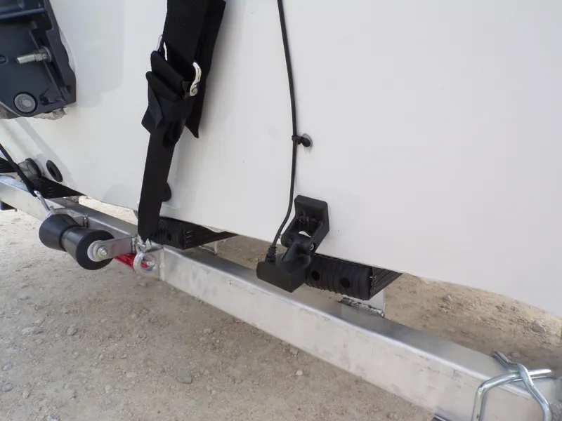 Slide: The Image of Rear view of a 2026 Xpress XP20CC boat trailer. - 30