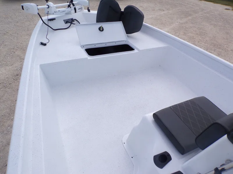 Slide: The Image of Interior of 2026 Xpress XP20CC boat with seating and storage. - 8