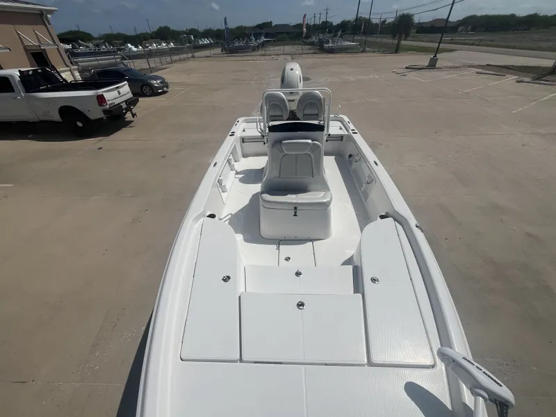 Slide: The Image of 2017 Blue Wave 2300 boat on parking lot, front view. - 19