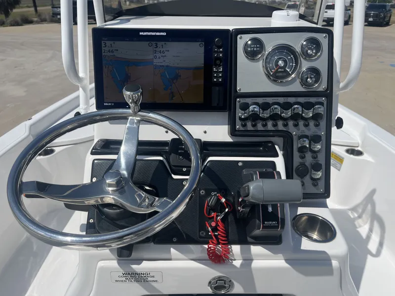 Slide: The Image of Control console of a 2017 Blue Wave 2300 boat. - 29